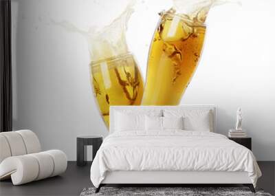 Two glasses of beer toasting with splash on white background Wall mural