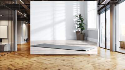 Unrolled grey yoga mat on floor in room Wall mural