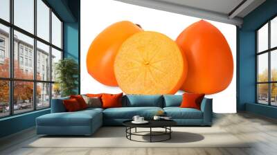 Whole and cut delicious ripe juicy persimmons on white background Wall mural