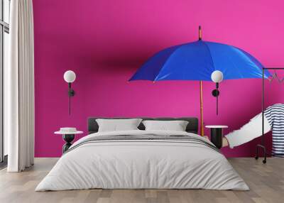 Woman holding beautiful umbrella on color background with space for design Wall mural