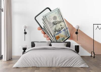 Woman holding smartphone with dollar banknotes on white background, closeup Wall mural