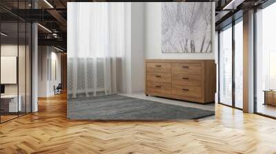 Wooden chest of drawers in modern living room interior. Space for text Wall mural