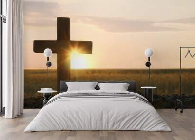 Wooden Christian cross outdoors at sunrise, space for text. Religion concept Wall mural