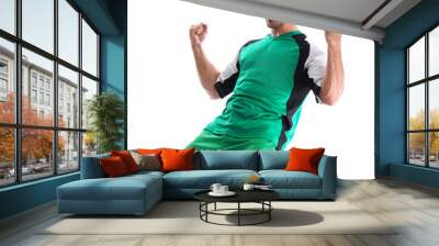 Young football player celebrating scoring of goal on white background Wall mural