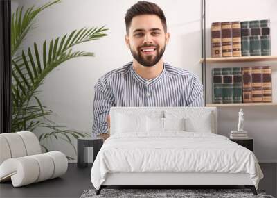 Young man using video chat at home, view from web camera Wall mural