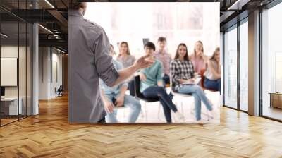 Young people having business training in office Wall mural