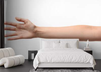 Young woman reaching hand for shake on white background, closeup Wall mural