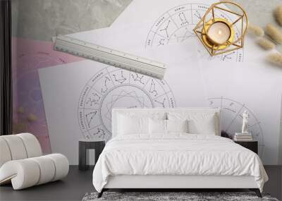 Zodiac wheels for making forecast of fate and astrological items for fortune telling on table, flat lay Wall mural