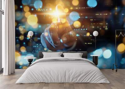 An individual interacting with a digital interface, surrounded by sparkling light effects, representing innovation and technology. Wall mural