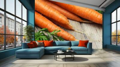 Close up of fresh carrot on rustic wooden background Wall mural