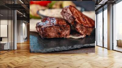 grilled beef steak with vegetables on gray slate background Wall mural