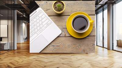 Workplace with office tools and gadgets. Cup of coffee on a table Wall mural