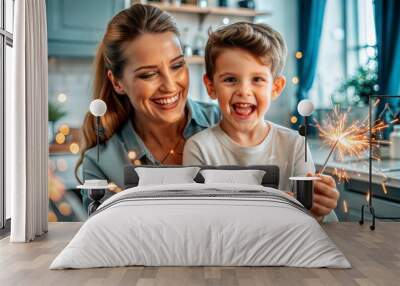 selective focus of smiling mother and son holding sparklers at home Wall mural