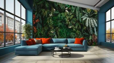 A background with an abstract design and a close-up texture of green leaves., tropical leaf and Nature concept. Wall mural