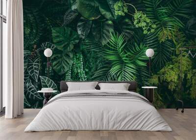 Close up tropical Green leaves texture and abstract background., Nature concept., dark tone. Wall mural