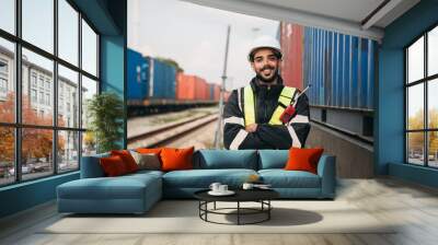 Supervisor inspecting inventory or task information on freight train cars and shipping containers. This pertains to logistics, including the import and export sectors. Wall mural