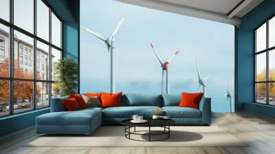 Wind generators turbines and blue sky. Wall mural