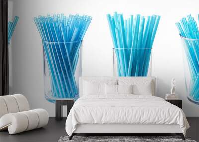 Plastic drinking blue straw collection isolated on transparent background Wall mural