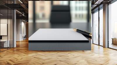 Empty notepad with a pen on a modern office desk, awaiting new ideas and tasks. Wall mural