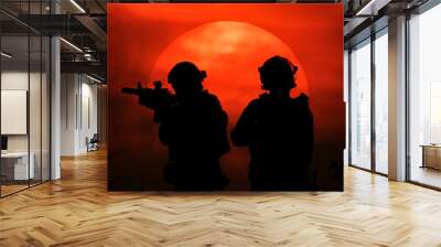 Silhouette illustration of two soldier in front of the big sun. Wall mural