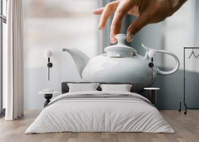 Cup of tea with teapot Wall mural