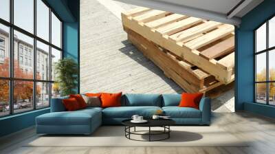 two old pallets on the floor with space Wall mural