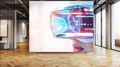 A close-up of a person wearing futuristic virtual reality goggles, immersed in a digital world with vibrant, colorful lights and patterns. Wall mural