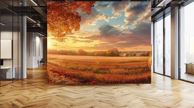 A serene scene of a sunset over a field with bales of hay and trees displaying autumn foliage, with warm golden light illuminating the scene, high detail Wall mural