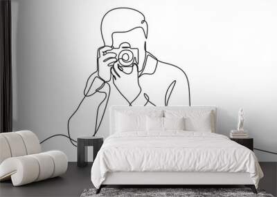 Continuous one line drawing of man taking picture with camera. Photography concept vector minimalist design. Wall mural