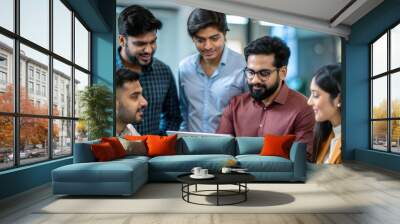 A group of Indian entrepreneurs brainstorming innovative fintech solutions in a startup environment.
 Wall mural