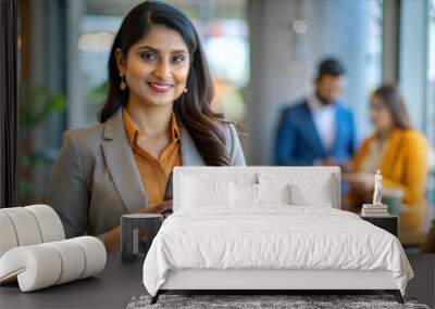 Confident Indian Businesswoman with Smartphone
 Wall mural