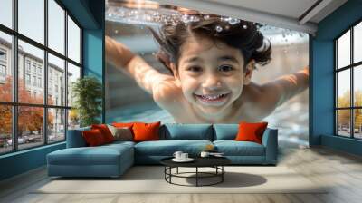 Laughing Indian Kid Diving Underwater
 Wall mural