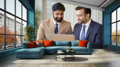 Two Indian Businessmen Sharing Ideas at Laptop
 Wall mural