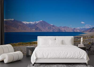 beautiful scenery of Pangong lake, blue lake water, blue sky, snow mountain surrounded at Pagong Tso, Leh, Ladakh, Jammu and Kashmir, India Wall mural