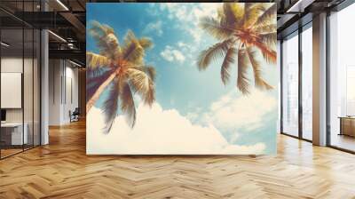 Blue sky and palm trees view from below, vintage style, tropical beach and summer background, travel concept Wall mural