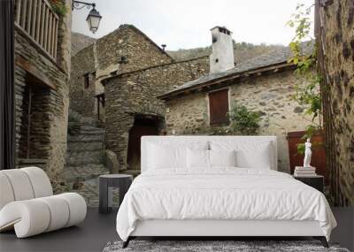 Evol, a picturesque village in Pyrenees-Orientales Department, southern France featuring houses built of schist with thackstone roofs  Wall mural