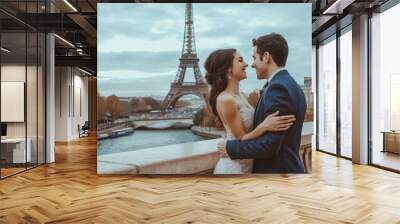 A joyful couple on a romantic date in Paris, right next to the Eiffel Tower. France for a honeymoon Wall mural