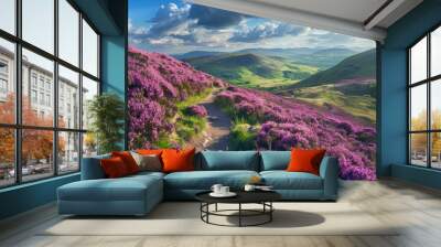 Colorful landscape scenery with a footpath through the hill slope covered by violet heather flowers and green valley, river, mountains and cloudy blue sky on background. Pentland hills, Scotland Wall mural