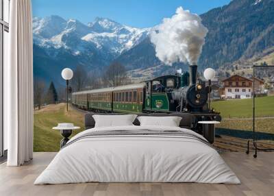 Mayrhofen, Innsbruck, Austria - May 1, 2017: The narrow gauge coal steam tourist train operated by Zillertal Railway runs between Jenbach and Mayrhofen. Wall mural