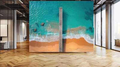 Aerial View of a Wooden Pier Extending into the Stunning Turquoise Ocean Wall mural