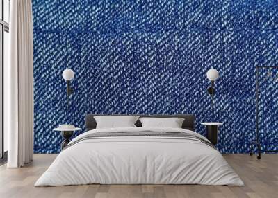 Blue denim fabric texture with diagonal weaving patterns and soft lighting, creating a classic and rugged look, ideal for fashion, textile design, or background concepts for creative projects
 Wall mural