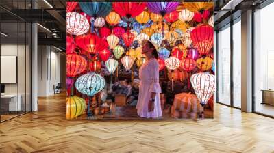 Travel woman choosing lanterns in Hoi An, Vietnam Wall mural