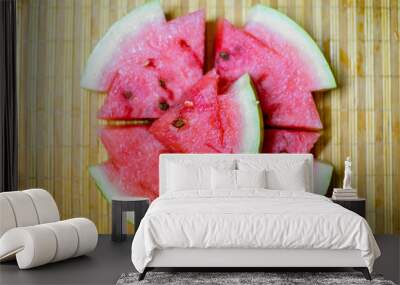 an image of a Fresh sliced red watermelon on a table Wall mural