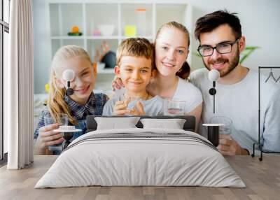 Family drinks water Wall mural