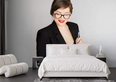 girl in a business suit and glasses Wall mural