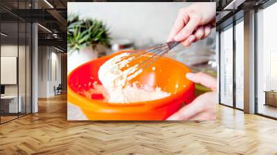 Woman making delicious chicken pot pie on a table Wall mural