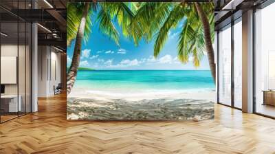 A view from under the shade of lush palm trees, revealing a sandy tropical beach meeting the vibrant blue sea, evoking a sense of calm and serenity in paradise. Wall mural