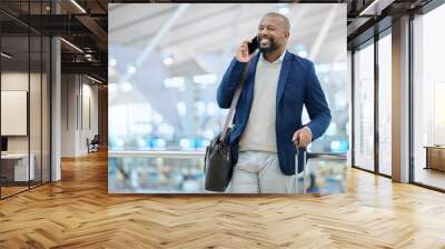 African businessman, phone call and airport with excited smile, luggage and conversation for planning travel. Corporate black man, smartphone and happy for business trip, immigration and networking Wall mural