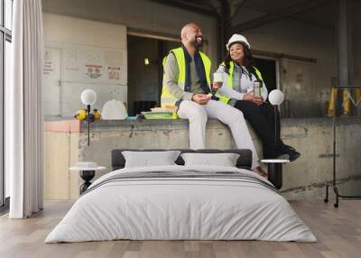 Business people, logistics, and lunch break at work site relaxing, talking and enjoying free time on the job. Black man and woman employee in shipping yard, warehouse or factory industry at rest Wall mural