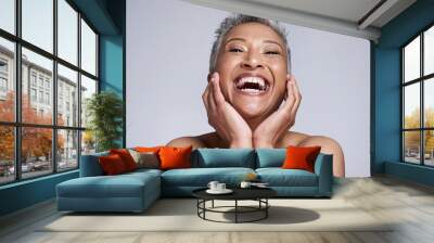 Happy, smile or skincare of senior woman in studio portrait for health or natural cosmetic routine treatment. Skin facial or comic elderly model with self care, glow or plastic surgery beauty Wall mural